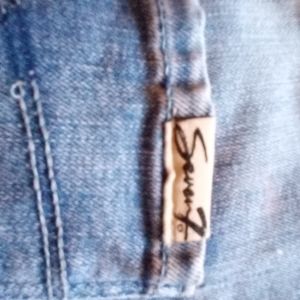 Seven7 light blue Rockstar skinny distressed blue jeans size 16.
